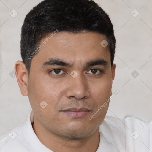 Neutral white young-adult male with short  black hair and brown eyes