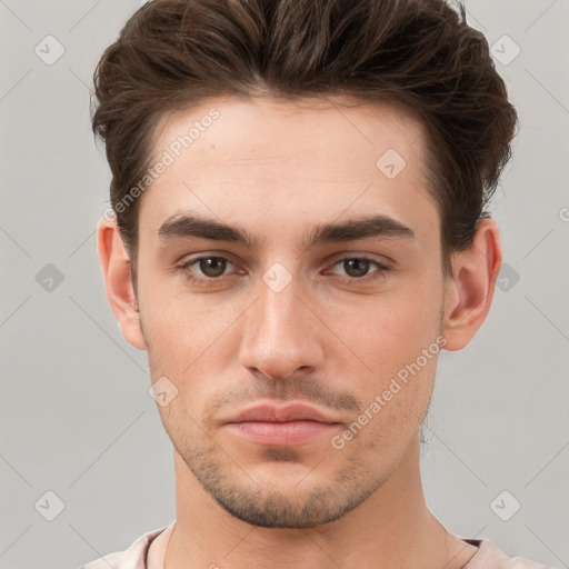 Neutral white young-adult male with short  brown hair and brown eyes