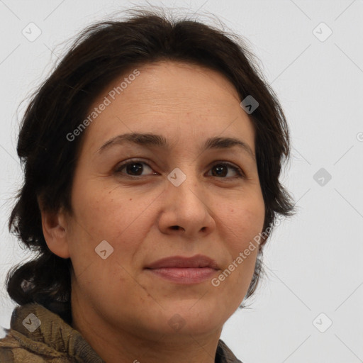 Joyful white adult female with medium  brown hair and brown eyes