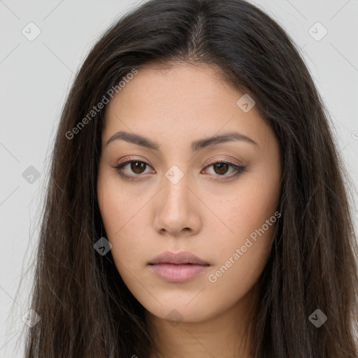 Neutral white young-adult female with long  brown hair and brown eyes