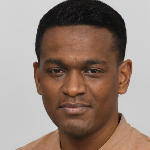 Neutral black young-adult male with short  black hair and brown eyes