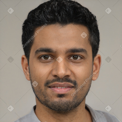 Joyful latino young-adult male with short  black hair and brown eyes