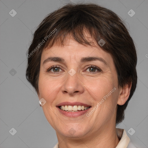 Joyful white adult female with medium  brown hair and brown eyes