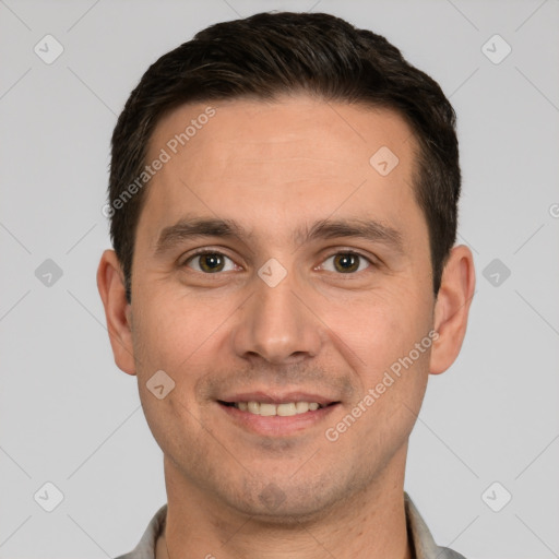 Joyful white young-adult male with short  brown hair and brown eyes