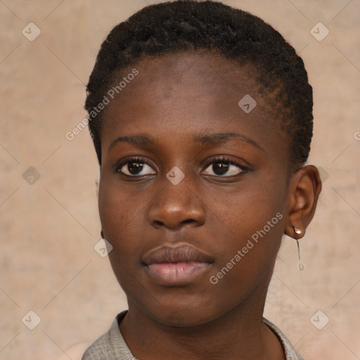 Neutral black young-adult female with short  brown hair and brown eyes