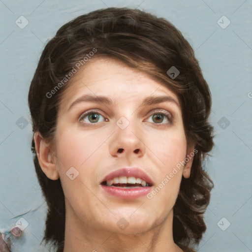 Joyful white young-adult female with medium  brown hair and green eyes