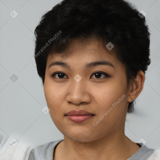 Joyful asian young-adult female with short  black hair and brown eyes