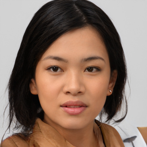 Neutral asian young-adult female with medium  black hair and brown eyes
