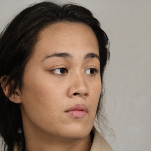 Neutral asian young-adult female with medium  brown hair and brown eyes