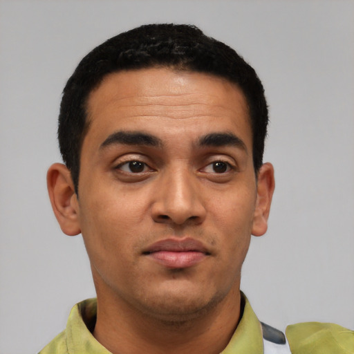 Neutral latino young-adult male with short  black hair and brown eyes