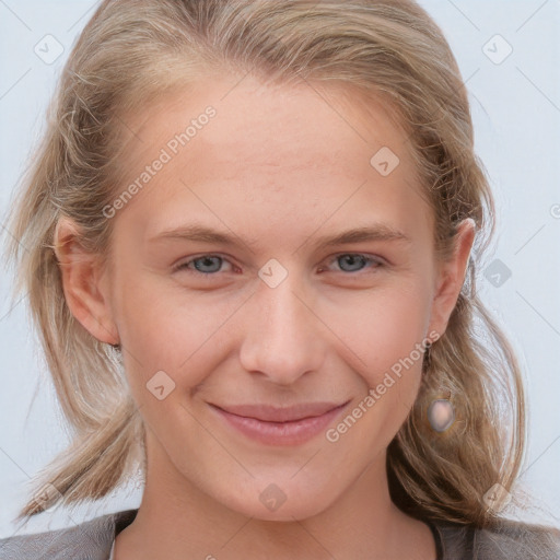 Joyful white young-adult female with medium  brown hair and blue eyes