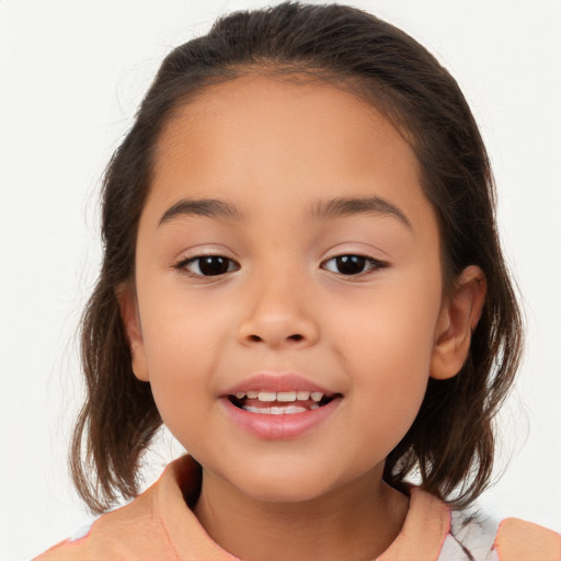 Joyful white child female with medium  brown hair and brown eyes