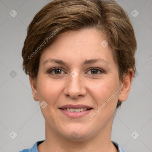 Joyful white young-adult female with short  brown hair and grey eyes