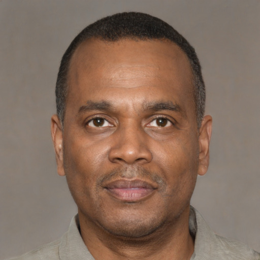Neutral latino adult male with short  black hair and brown eyes