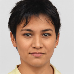 Joyful asian young-adult female with short  brown hair and brown eyes