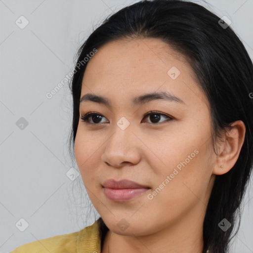 Joyful asian young-adult female with medium  black hair and brown eyes