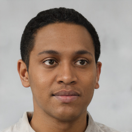 Neutral black young-adult male with short  brown hair and brown eyes