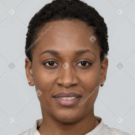 Joyful black young-adult female with short  black hair and brown eyes