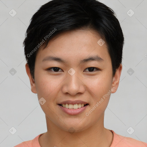 Joyful asian young-adult female with short  black hair and brown eyes