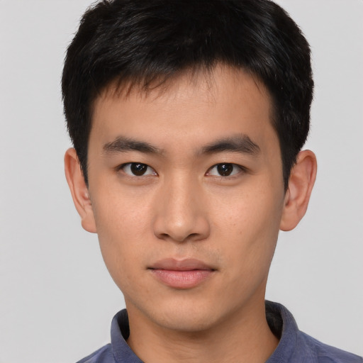Neutral asian young-adult male with short  brown hair and brown eyes