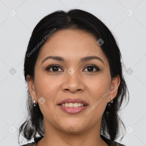 Joyful latino young-adult female with medium  brown hair and brown eyes