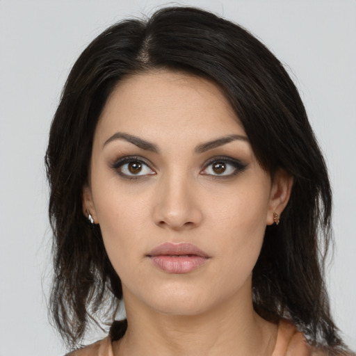 Neutral white young-adult female with medium  brown hair and brown eyes