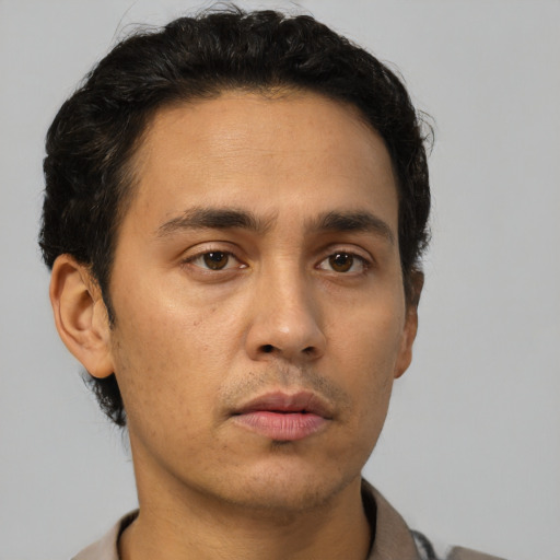 Neutral asian young-adult male with short  brown hair and brown eyes