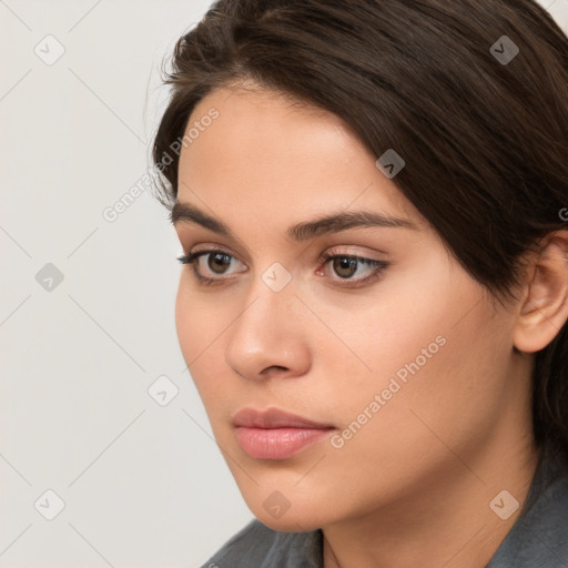 Neutral white young-adult female with medium  brown hair and brown eyes