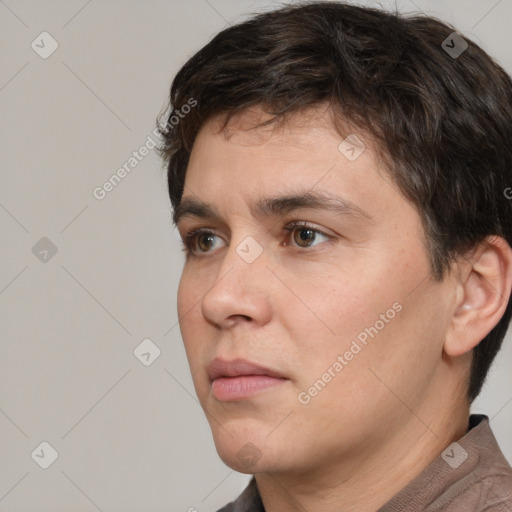 Neutral white young-adult male with short  brown hair and brown eyes