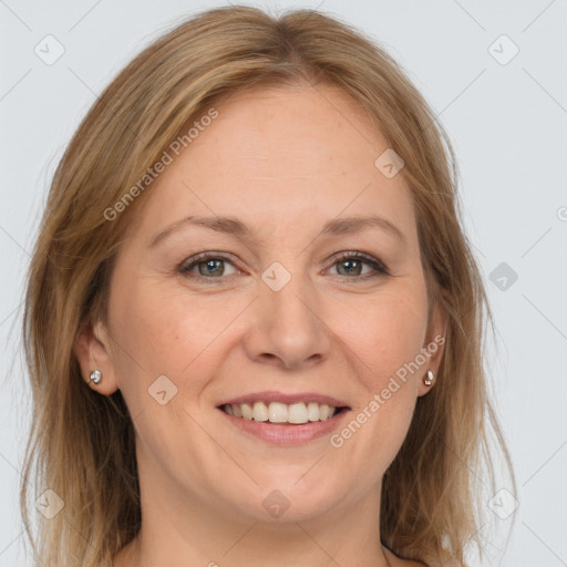 Joyful white adult female with medium  brown hair and grey eyes