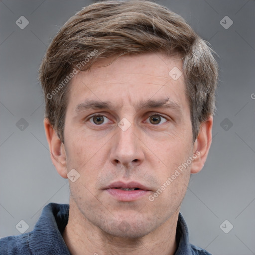 Neutral white adult male with short  brown hair and grey eyes