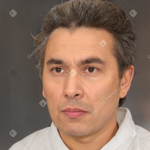 Neutral white adult male with short  brown hair and brown eyes