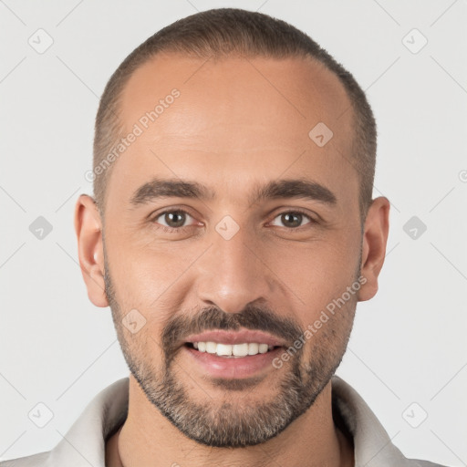 Joyful white young-adult male with short  brown hair and brown eyes