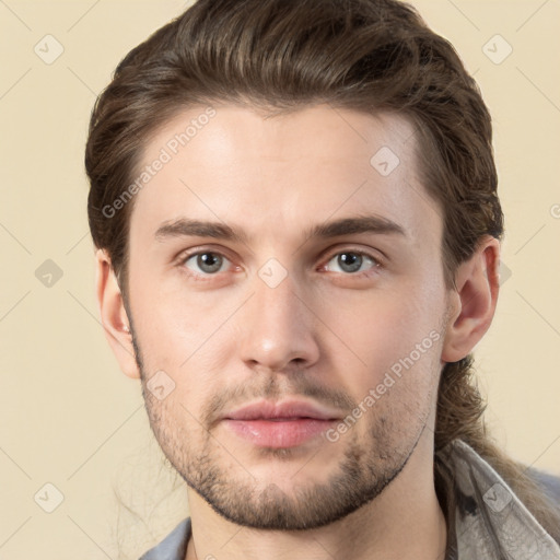 Neutral white young-adult male with short  brown hair and brown eyes