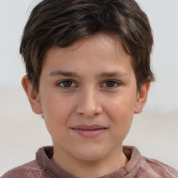 Joyful white child female with short  brown hair and brown eyes