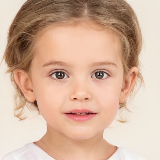 Joyful white child female with medium  brown hair and brown eyes