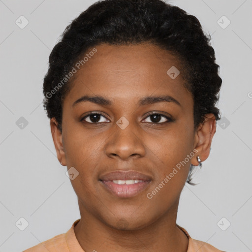 Joyful black young-adult female with short  black hair and brown eyes