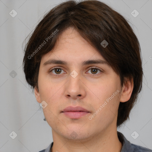 Neutral white young-adult male with medium  brown hair and brown eyes