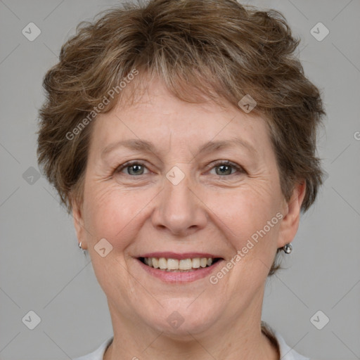 Joyful white adult female with short  brown hair and brown eyes