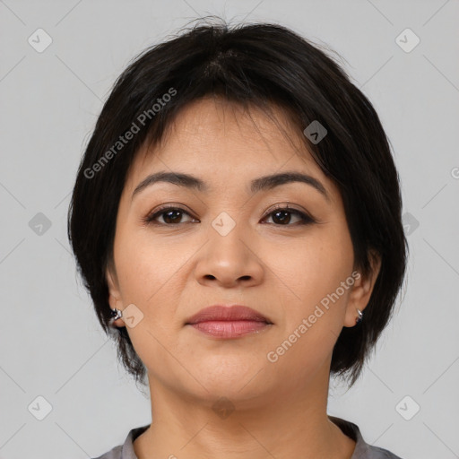 Joyful asian young-adult female with medium  black hair and brown eyes