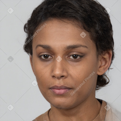 Neutral white young-adult female with short  brown hair and brown eyes