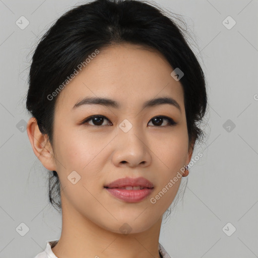 Joyful asian young-adult female with medium  black hair and brown eyes