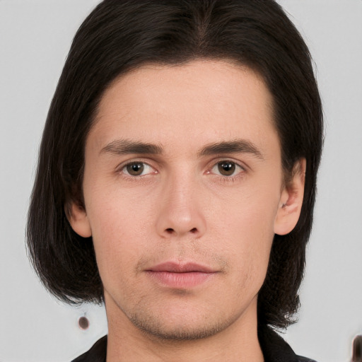 Neutral white young-adult male with medium  brown hair and brown eyes