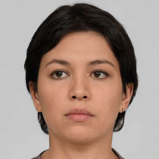 Neutral asian young-adult female with medium  brown hair and brown eyes