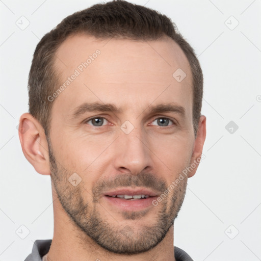 Joyful white adult male with short  brown hair and brown eyes