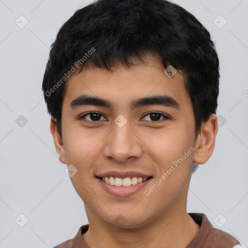 Joyful asian young-adult male with short  black hair and brown eyes