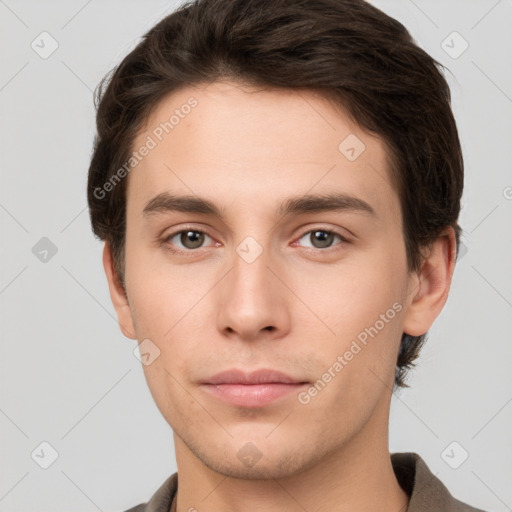 Neutral white young-adult male with short  brown hair and brown eyes