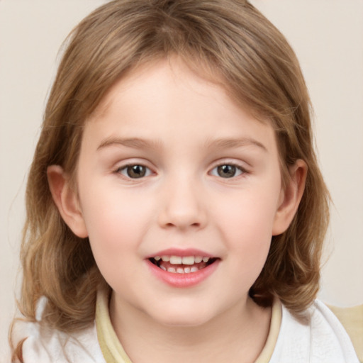 Joyful white child female with medium  brown hair and grey eyes