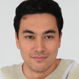 Joyful asian young-adult male with short  black hair and brown eyes