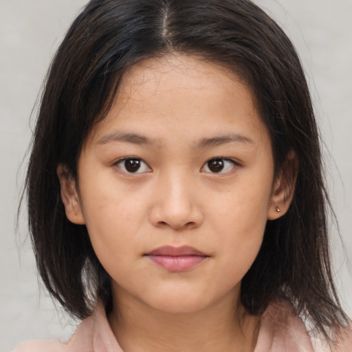 Neutral asian child female with medium  brown hair and brown eyes